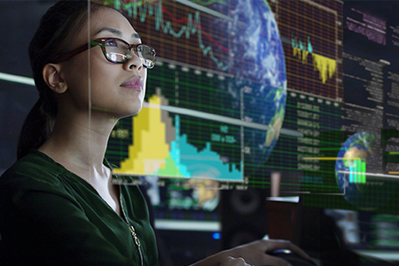 image of woman analyzing data