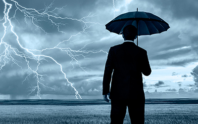 image of man holding umbrella in lightning storm