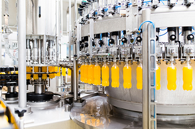 image of soda bottles in manufacturing plant