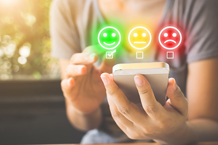 image of mobile app quality ratings: happy, neutral, sad