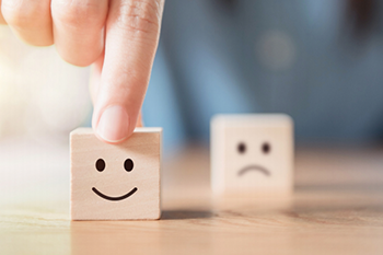 image of survey happy and sad face