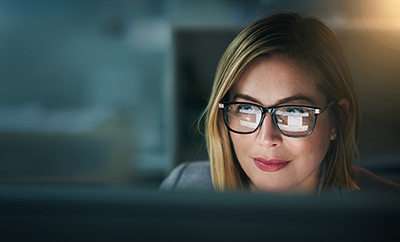 image of woman working at computer